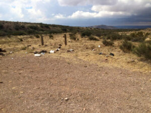 Trash scattered across the desert